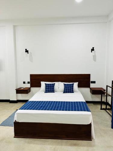 Postel nebo postele na pokoji v ubytování Sundaze Villa