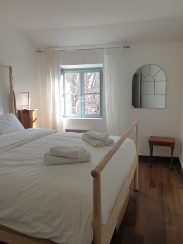 Un pat sau paturi într-o cameră la La Robine