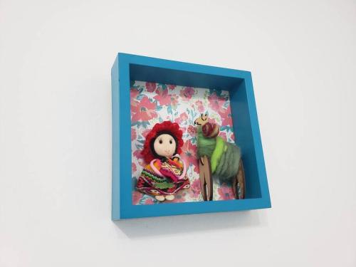 una foto de una muñeca en un marco de imagen en Depto pleno centro de Salta ! hasta 5 personas en Salta