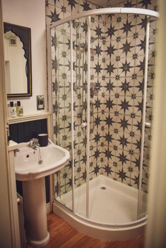 a bathroom with a shower and a sink at The Folly in Sedbergh