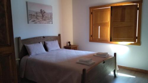 Säng eller sängar i ett rum på Quinta da Fonte