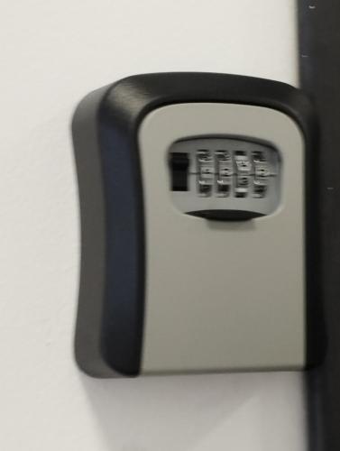 a close up of a remote control on a wall at Stan na dan Zvornik in Zvornik
