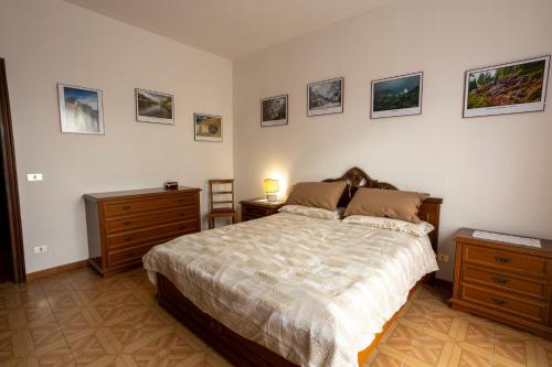 A bed or beds in a room at Appartamento vista Alpi biellesi