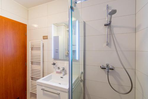 a bathroom with a shower and a sink at Flexible SelfCheckIns 43 - Zagreb - Luxury - Parking - Loggia - Brand New in Zagreb