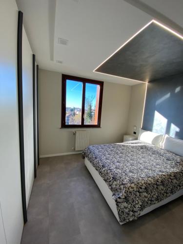 Postel nebo postele na pokoji v ubytování La Casa di Davide Milano Monza