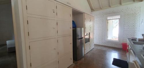Kuchyň nebo kuchyňský kout v ubytování Paradise Shore House