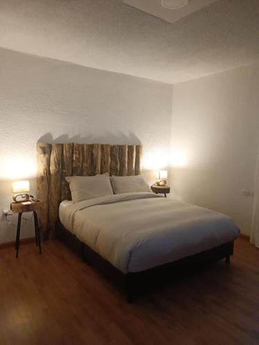 Postel nebo postele na pokoji v ubytování Hacienda El Castillo Hotel Boutique