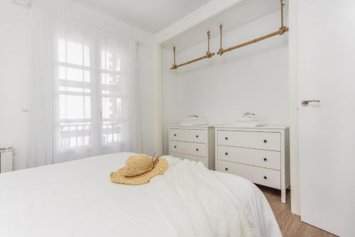 Katil atau katil-katil dalam bilik di Apartamento turístico Legate