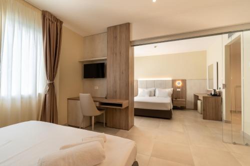 Hotel Estenseにあるベッド