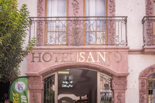 a hotel sign on the front of a building at Hotel SanJo in San José Iturbide