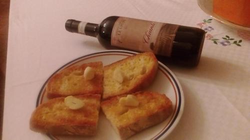 a plate with three pieces of bread on a table at Le Mimose B&B in Vinci