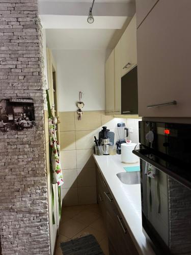Kuchyň nebo kuchyňský kout v ubytování Apartments Kuljaca