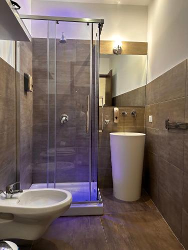 a bathroom with a shower and a sink at Marilù in Palermo