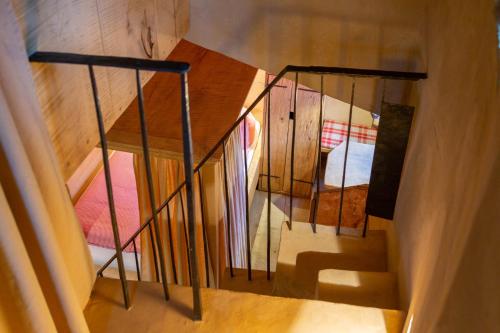 an overhead view of a staircase with metal railings at Turm zu Schloss Schedling in Trostberg an der Alz