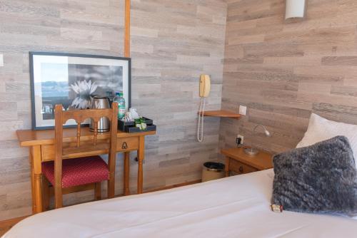 Postel nebo postele na pokoji v ubytování Hotel des Pyrénées