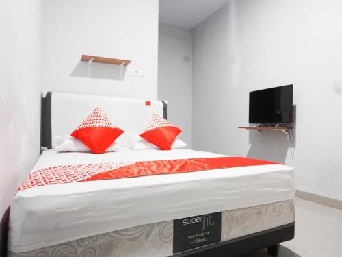 Katil atau katil-katil dalam bilik di Hotel O Pondok Cahaya