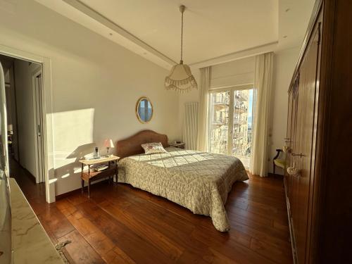 מיטה או מיטות בחדר ב-Appartamento Mira Capri