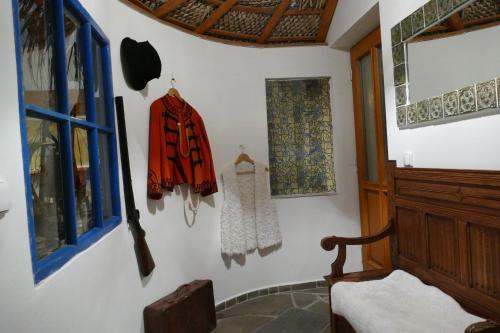 a room with clothes hanging on the wall at Chalupa Pohoda in Velké Karlovice