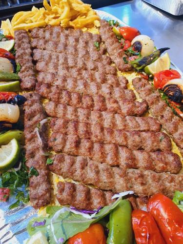 a plate of food with at شقة سيلا in Irbid