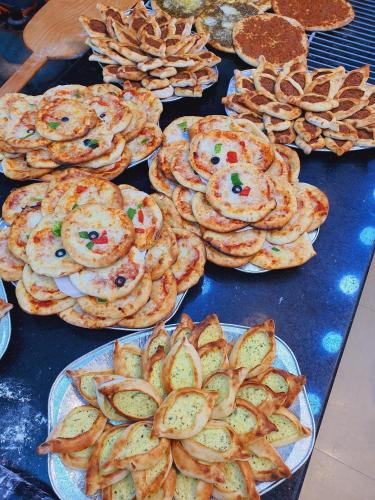 a bunch of plates of food on a table at شقة سيلا in Irbid