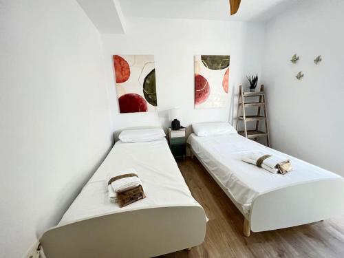 Postel nebo postele na pokoji v ubytování PUSHE Playa Granada Beach & Golf 13