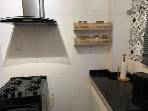 Dapur atau dapur kecil di Apto 1o andar novo 2 Dorm - próximo ao centro