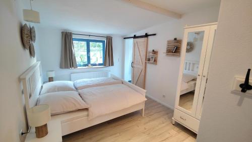 Postel nebo postele na pokoji v ubytování Ferienhaus im Wesenitztal