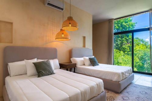 MARQUEZ II MANOR TULUM By SANDY POWERFUL photo 2