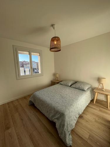 Posteľ alebo postele v izbe v ubytovaní Appartement Cap city