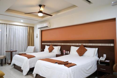 Postel nebo postele na pokoji v ubytování Ivissa Hotel