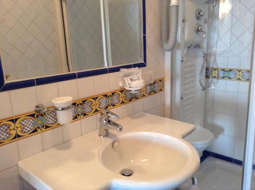 Kúpeľňa v ubytovaní Hotel Lidomare
