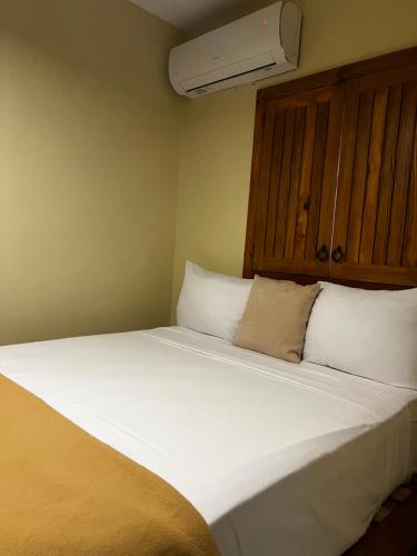 Cama o camas de una habitación en Hotel Yamilí