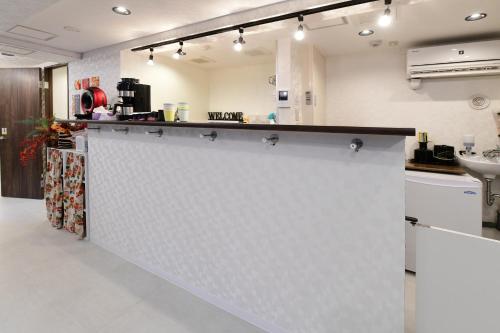 無料wi-fi JING HOUSE 秋葉原 電動自転車レンタルにあるキッチンまたは簡易キッチン