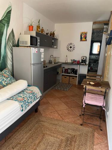 Una cocina o cocineta en L’anthurium