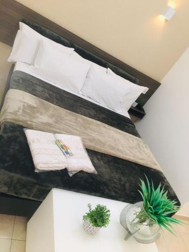Katil atau katil-katil dalam bilik di Hotel Malka