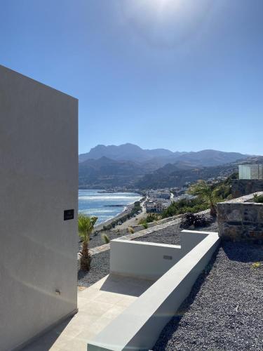 a view of the ocean from a house at Evgoro - Infinite View in Tsoútsouros