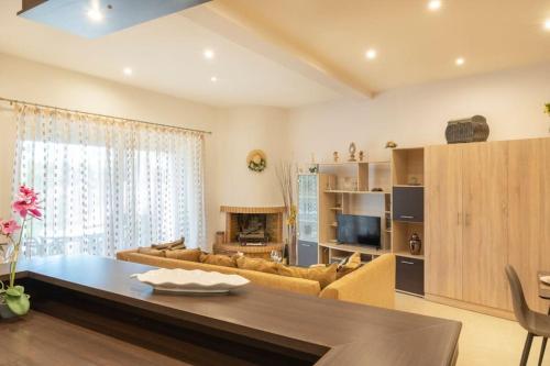 A television and/or entertainment centre at Villa Red Porto Cheli
