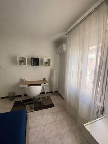 TV a/nebo společenská místnost v ubytování TRILOCALE DUOMO + TERRAZZO panoramico cond.