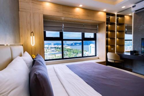 Postel nebo postele na pokoji v ubytování FLC Sea Tower Quy Nhon - Tran Ocean View