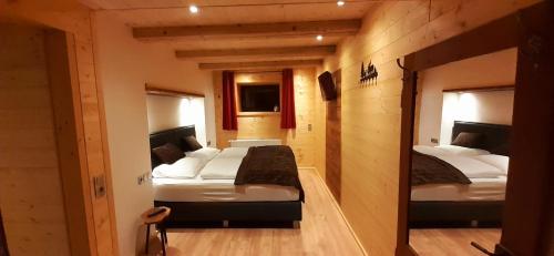 Alpen Lodge Berwangにあるベッド