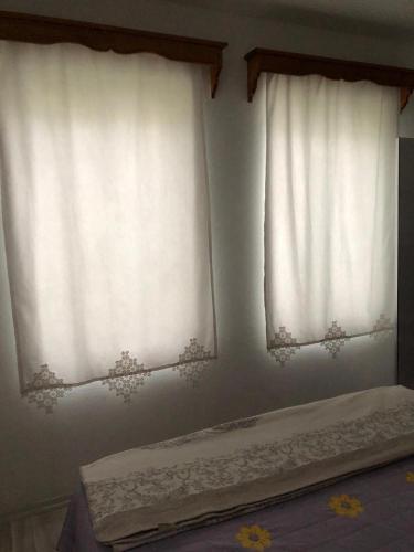 Postel nebo postele na pokoji v ubytování Bodrum Merkezde Müstakil ev Temmuz Ağustos Kiralık