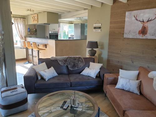 A seating area at Gîte de charme en Ardennes