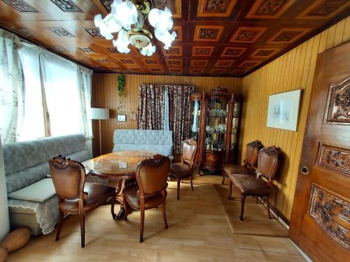 a dining room with a table and chairs at Grandmother's Vegetable garden in Anseong