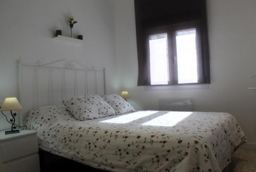 Postel nebo postele na pokoji v ubytování Apartamento Calle Huelva by CasaTuristica