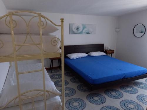 Ένα ή περισσότερα κρεβάτια σε δωμάτιο στο Apartment in Apulia near Ionian Sea Beach