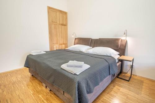 Postel nebo postele na pokoji v ubytování Prague Centre Apartments