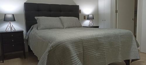 Кровать или кровати в номере Parque urbano