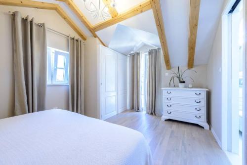 Postel nebo postele na pokoji v ubytování Cavtat Cozy Retreat close to beach