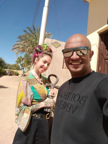 a man and a woman standing next to each other at Safari Abu Simbel in Abu Simbel