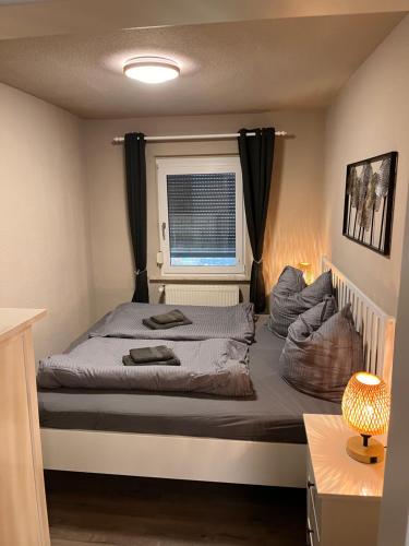 Un pat sau paturi într-o cameră la Kiefernblick